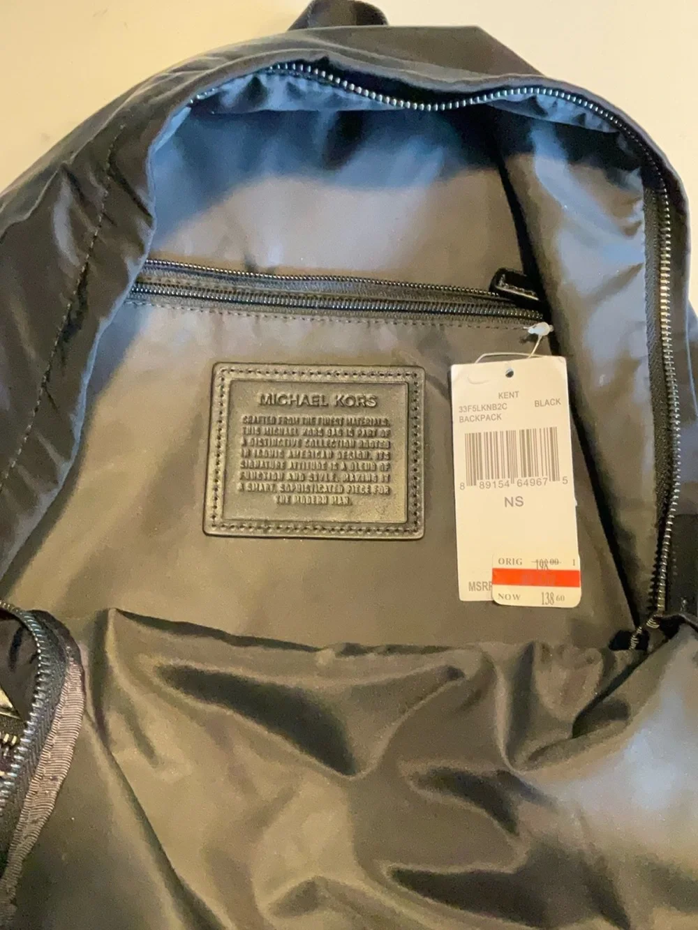 Black Michael Kors Kent Backpack. Silver hardware